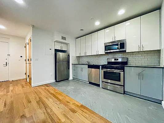 3rd image of 212 E 14th St APT 3R