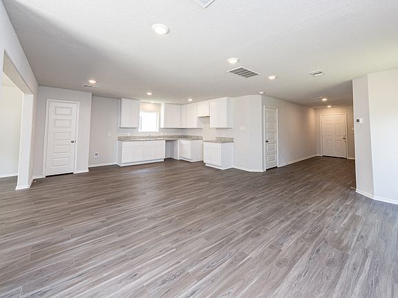 Family Room to Dining and Kitchen