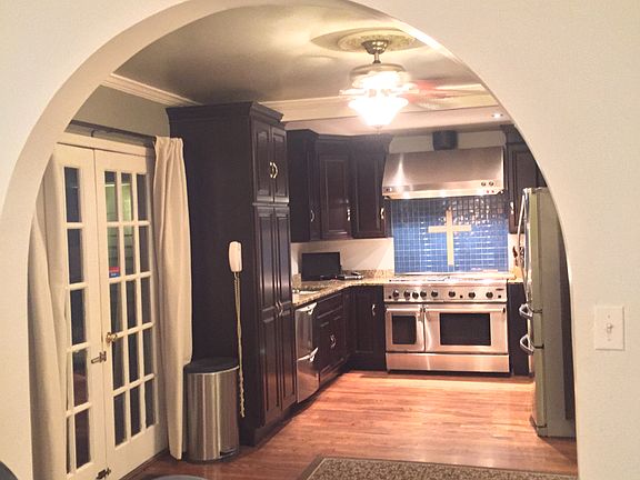 arched doorway to kitchen