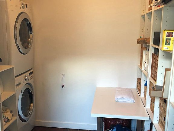 Separate laundry/storage room on the second floor