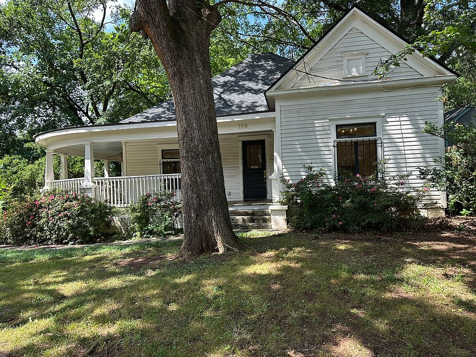 Beautiful Victoria house with large wrap around front porch, on one of the best streets in reynoldstown