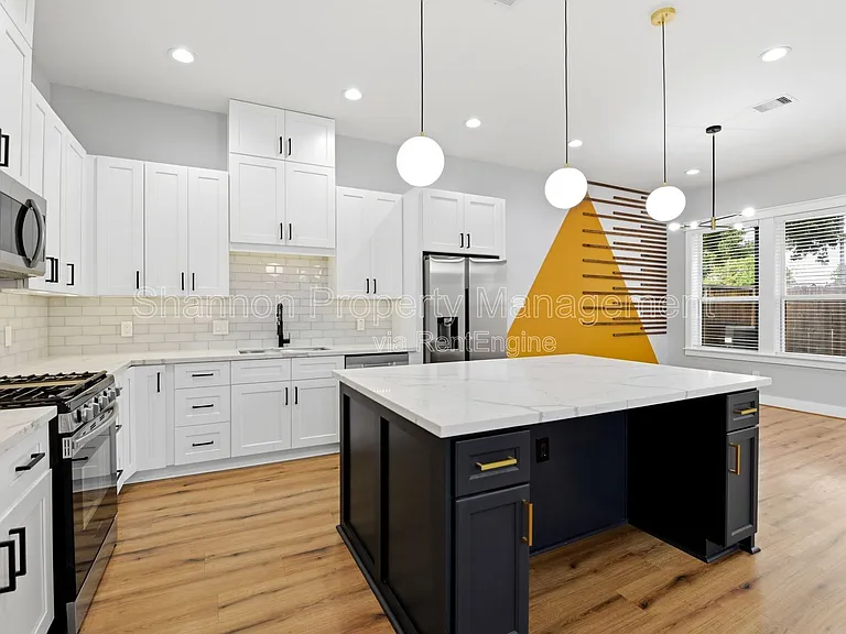 6476 T C Jester Blvd — Photo 14