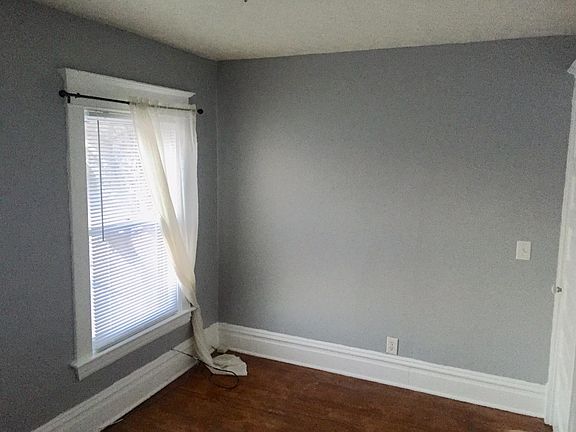 Bedroom comfortably fits a Queen bed