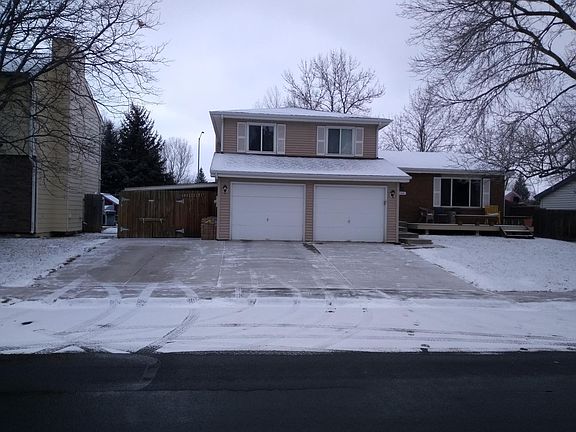 2 car garage with bike port and 3 driveway spaces