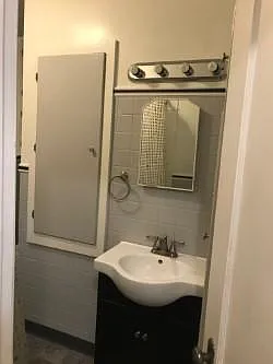 full bathroom with tub