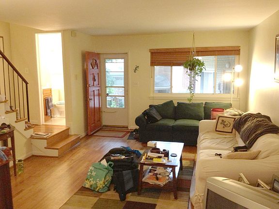 Bright living room with hardwood floors