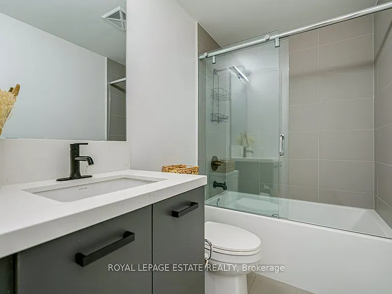 1888 Queen St E #211 — Photo 19