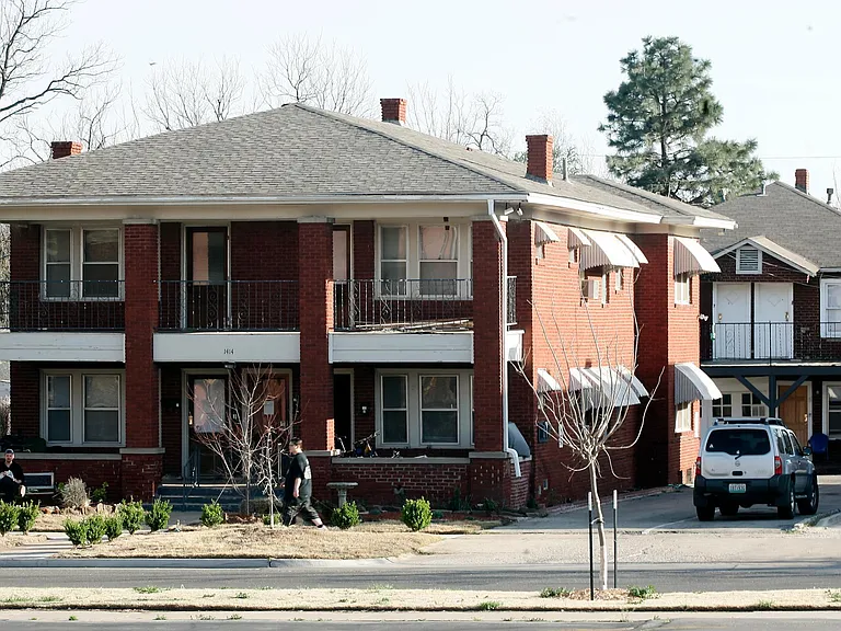 The available unit (Unit 6) is in the back building upstairs on the right side.