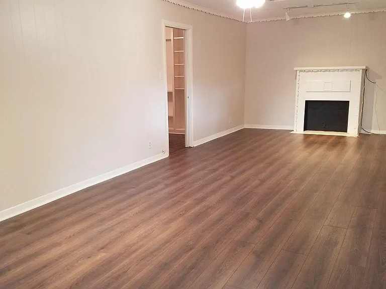 Large Family Room One door leads to back yard, another door to attached garage