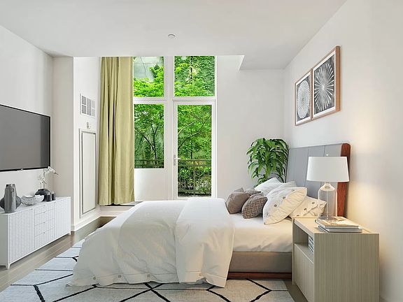 3rd image of 130 W 19th St #Townhouse