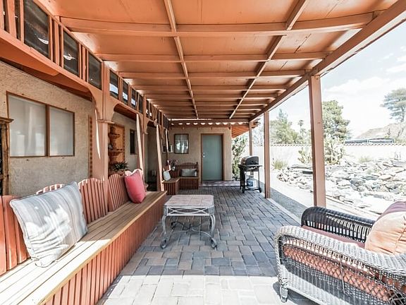 Casita portico with BBQ and backyard oasis