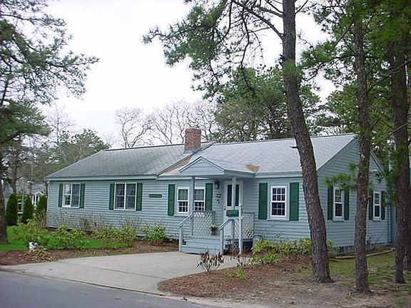 view of home, 2 driveways