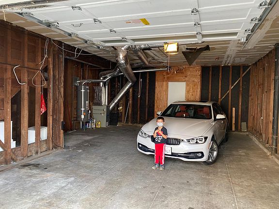 Enormous garage. Big enough for two cars...and a 5 year old!