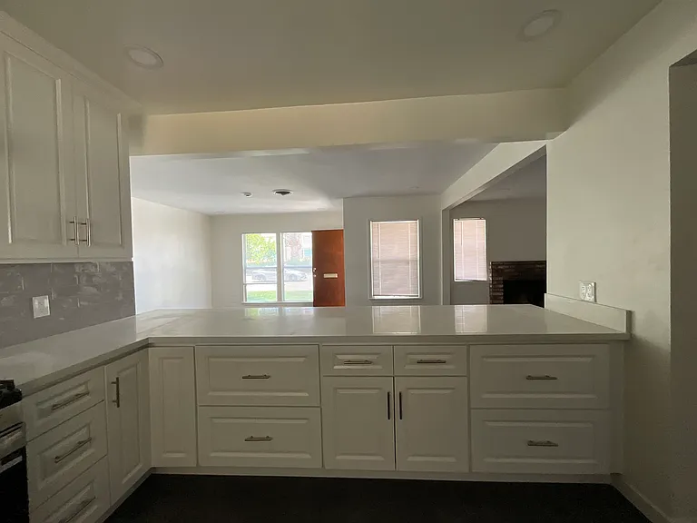 Open concept with view to the living room and dining room so you could talk and work at the same time