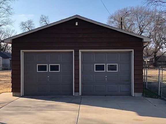 2 car heated garage with work bench and lots of storage
