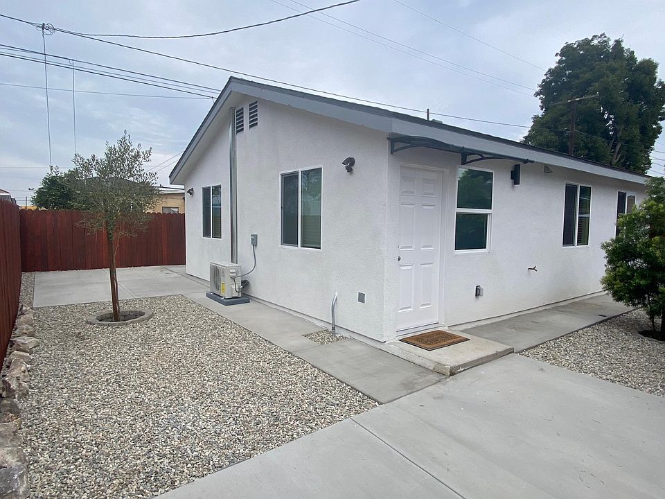 Front of the home and rear open patio