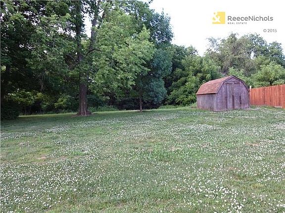 Fantastic back yard, level, with a storage shed.  Lot backs to private woods.