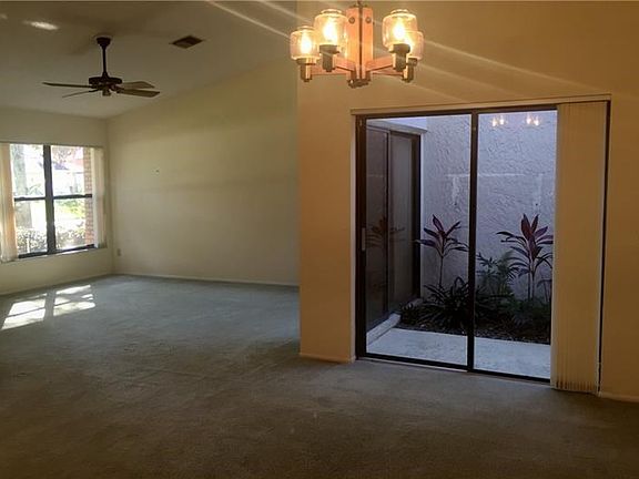Living Room/Dining Room Combination with views to the atrium