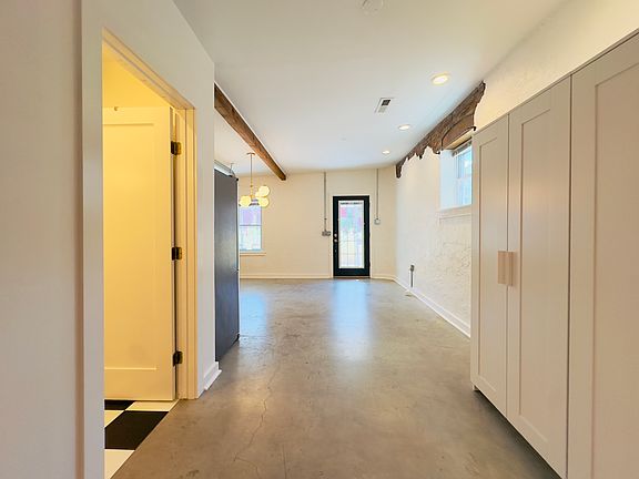 Southside view of downstairs kitchen and hallway