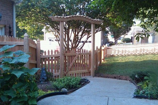 Fenced-in & shady backyard.
