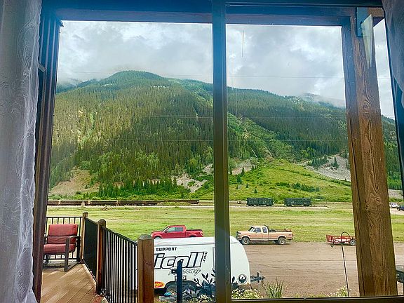 south window, mountain views