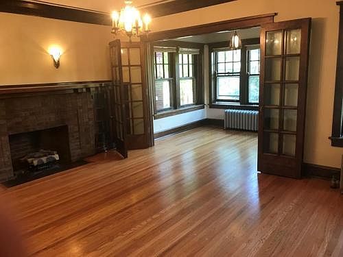 Living Room and Sun Room with original French Bi Fold Doors