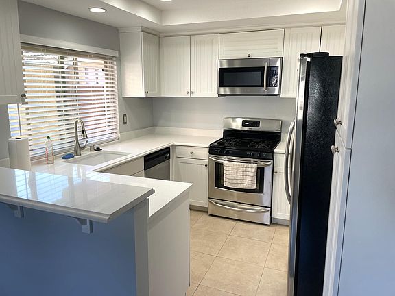 kitchen with steel appliances and brand new Bosh dishwasher