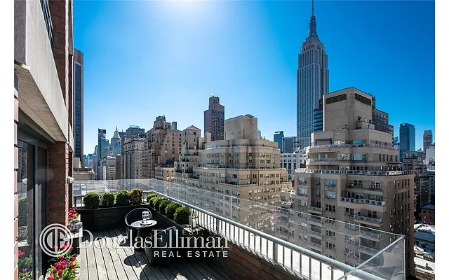 Sold by Douglas Elliman | media 18