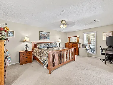 Primary bedroom from hall entrance