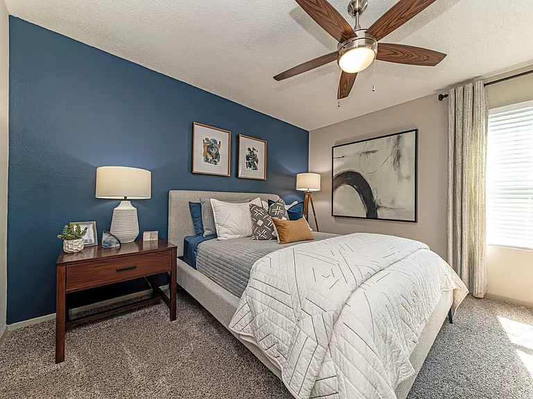 Bedroom with carpet and overhead lighting
