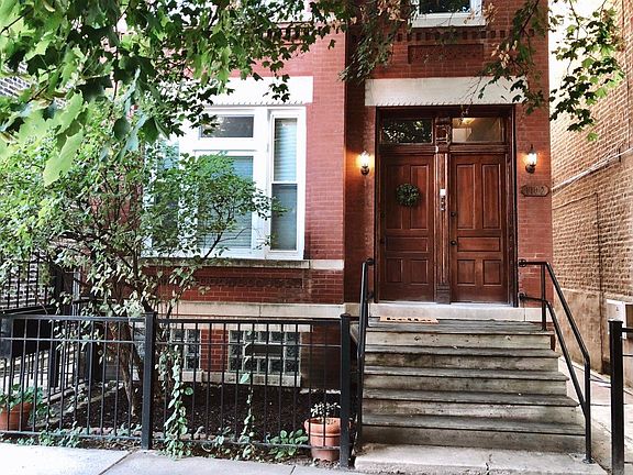 Building entrance. Unit uses door on the left