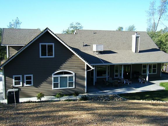 Rear Patio /Poolsite on Right