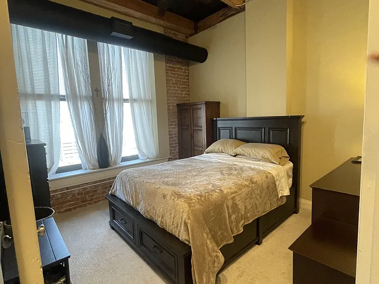 High quality queen size bed and frame with storage underneath.