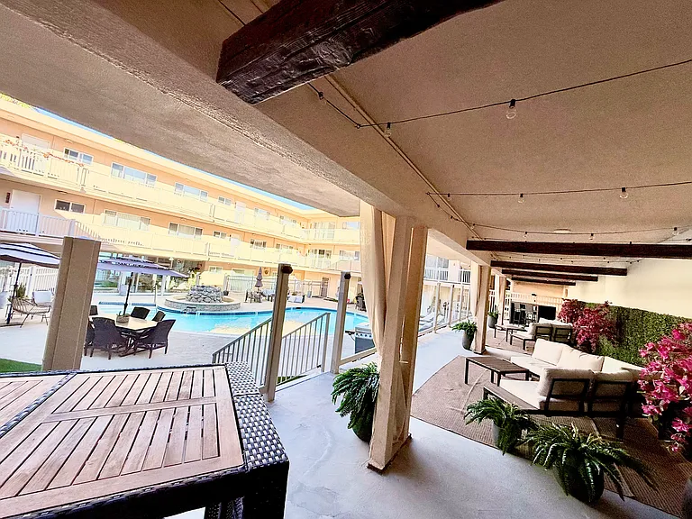 Beautiful outdoor but covered Water front co-work area with ocean & pool view. Work from home to the sounds of the calming water fountain