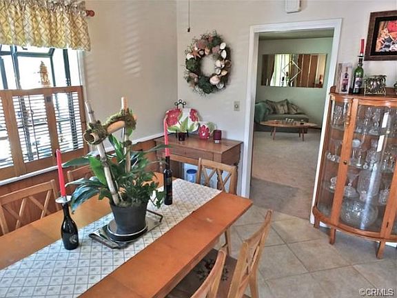 Dining area looking into the living room beyond.
