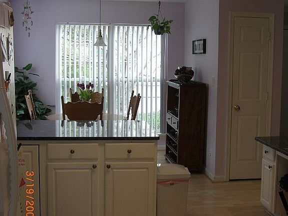 Looking across kitchen into breakfast nook (opposite side of kitchen)