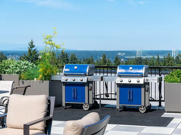 Fire up the grill and take in sweeping views of the Olympic Mountains and the iconic Tacoma Narrows Bridge. Our two rooftop grills create the perfect backdrop for unforgettable meals.