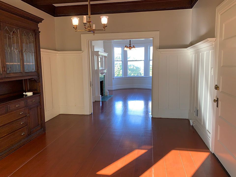 Formal Dining Room with Gorgeous Built in Cabinetry and Box Beamed Ceiling