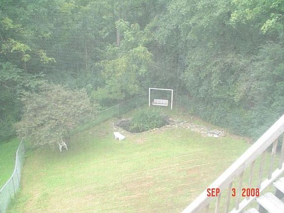 Fenced yard & pond