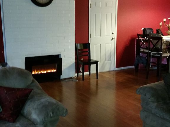 Lovely and Spacious living area with hardwood floors