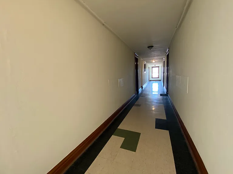 Looking other way down hallway.