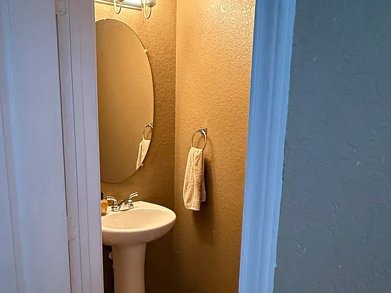 The guest bath room (1/2 bath) is available to guests on the downstairs level. A convenient place also for when you get home from running errands and come in from the garage