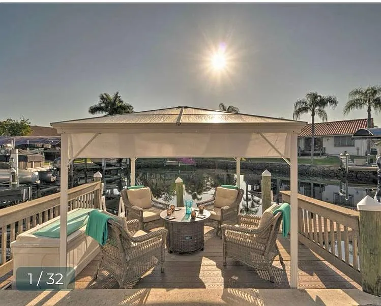 Enjoy your day on the deck dock over the water - 215 Riviera Ct