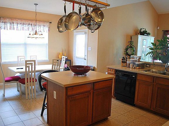 Upgraded cabinets & built in kitchen appliances adding even more counter space