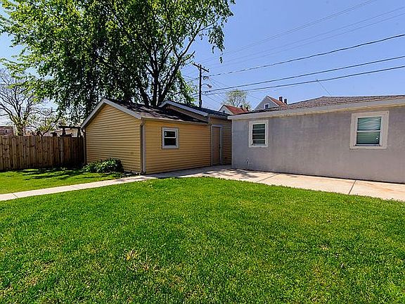 Backyard with 2 car garage