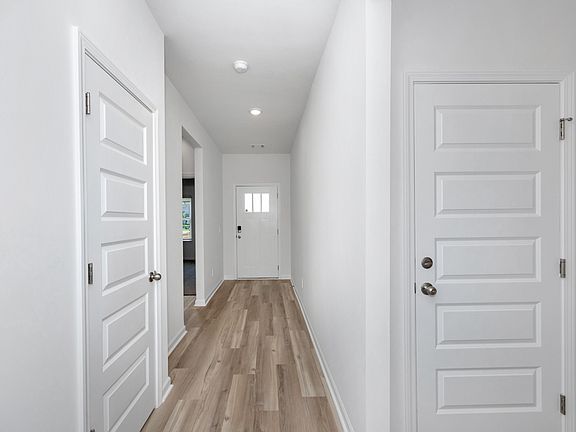 The Chandler floorplan with the Charm White interior package.