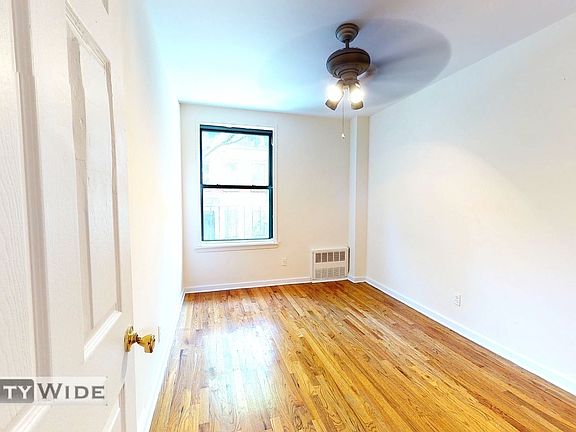 2nd image of 21 E 2nd St APT 10A