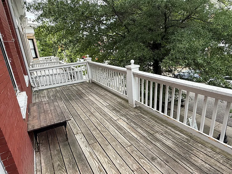 Private upper porch, ideal for relaxing with a glass of wine.