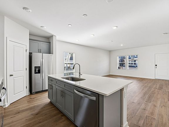 The kitchen apos s functional layout makes meal-prep much easier.