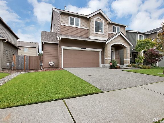 Home has 2 car garage and a half. Which is an extra space for storage and/or hobby area.
